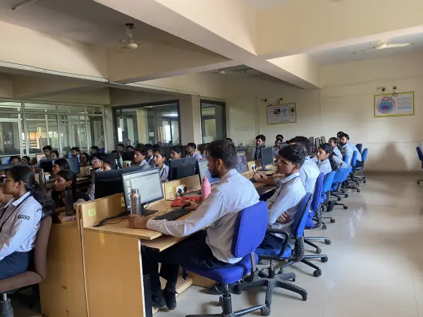 Students in a computer lab during a hands-on AI workshop